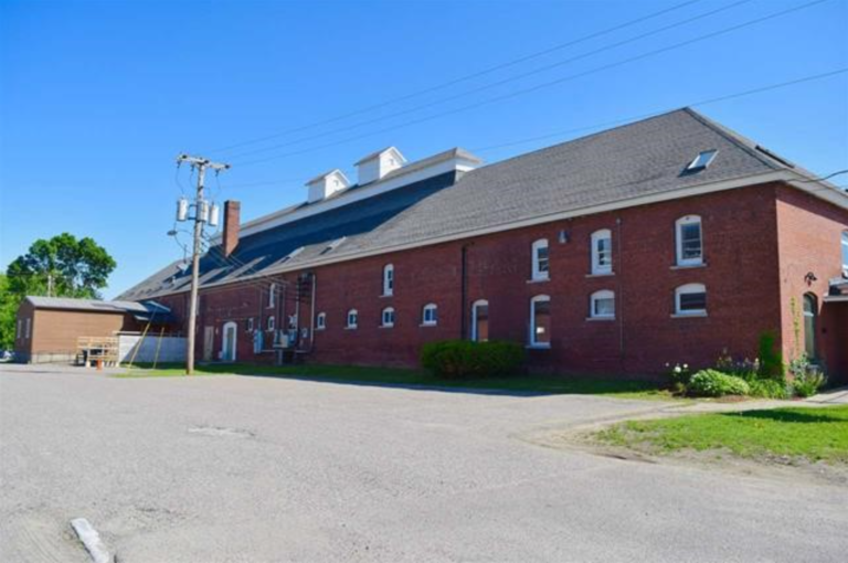 Side of building with space available at 182 Hegeman Ave, Colchester, VT