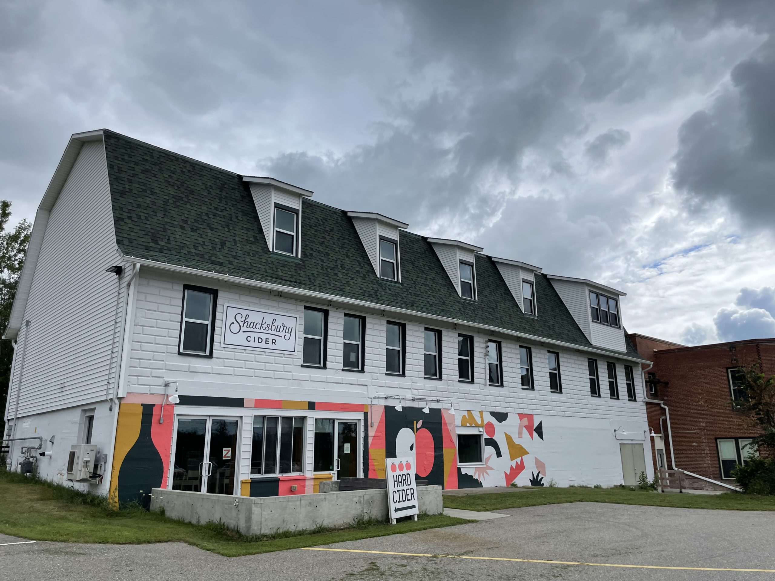 Exterior of a commercial property for rent at 11 Main Street, Vergennes, VT that used to be the home of Shacksbury Cider.