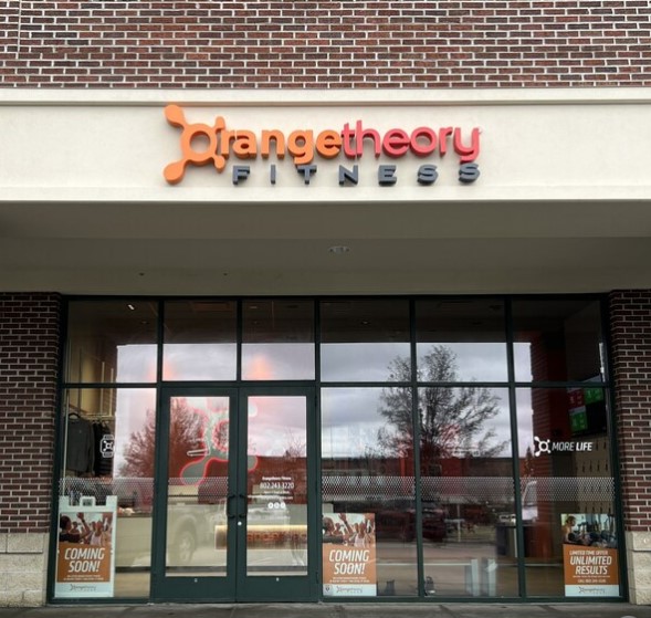 Front doors of the new Orange Theory Location at Maple Tree Place leased from Donahue & Associates