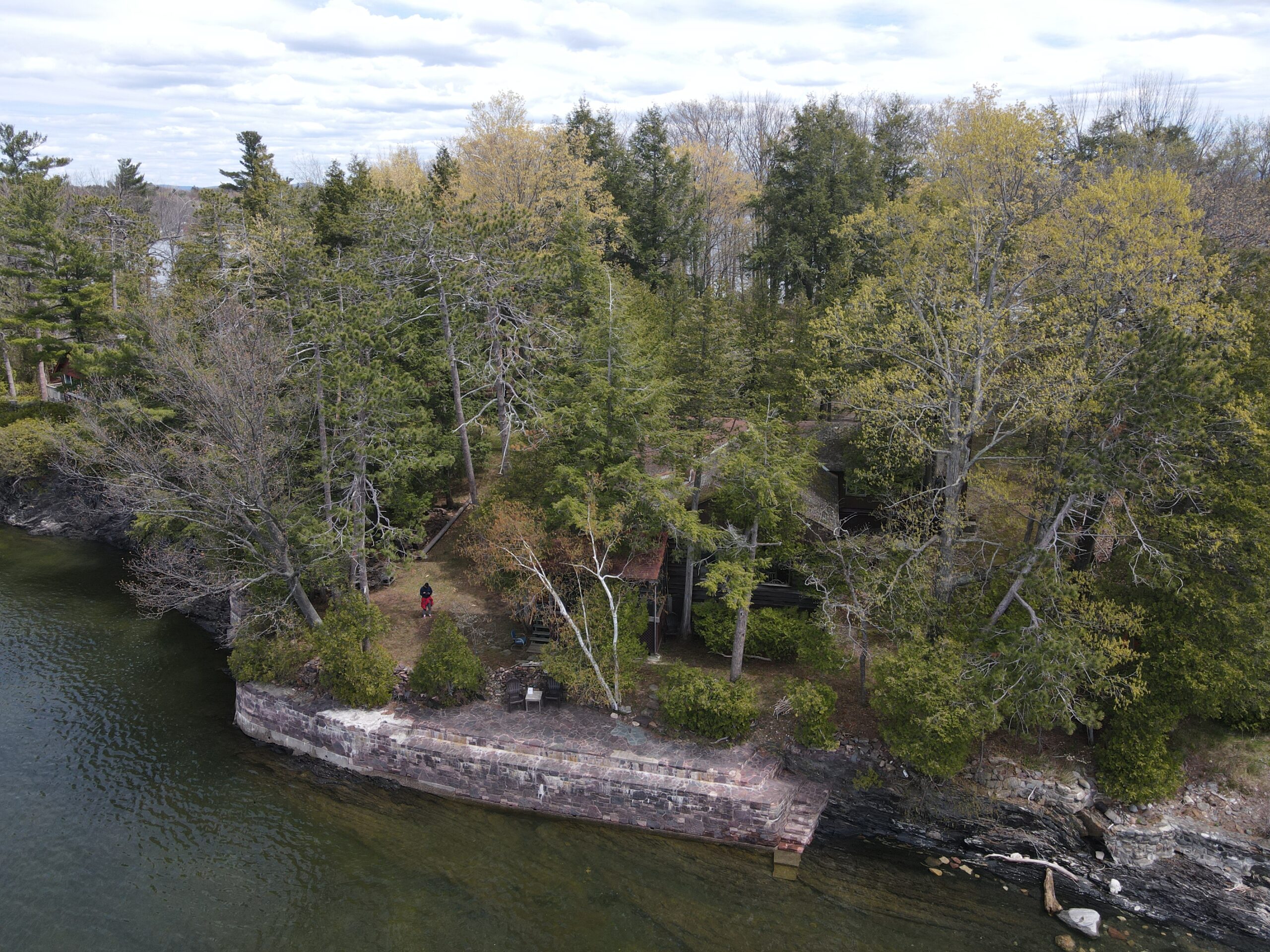 Exterior birds eye view of the dock and property for sale at 506 Appletree Point Road, Burlington, VT.