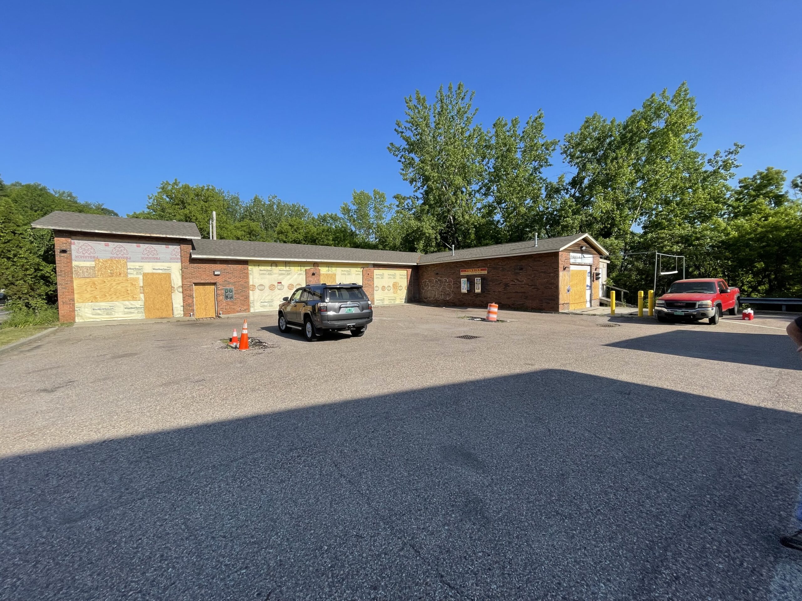 Exterior of a brick warehouse building for lease at 207 Riverside Avenue, Burlington, VT.